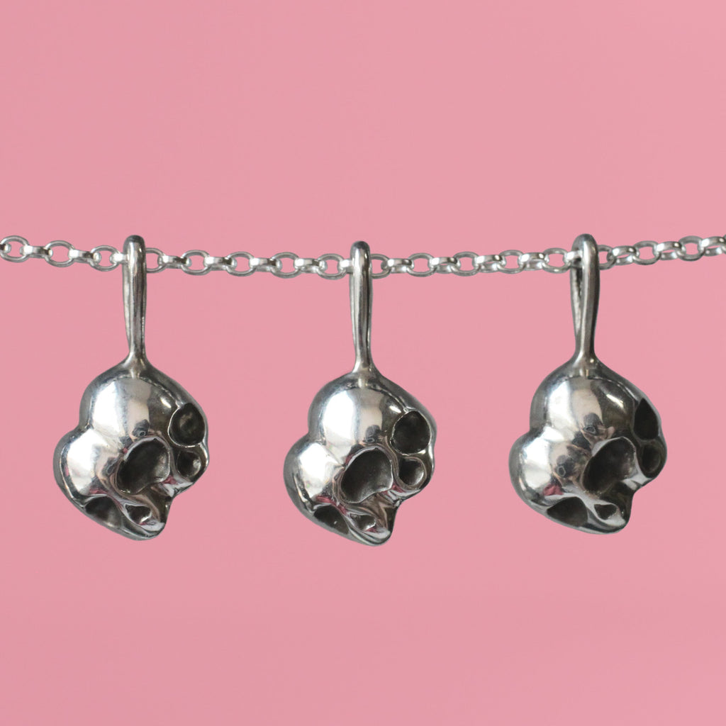 Double Skull Pendant